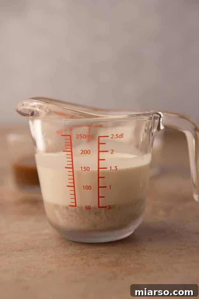 Pumpkin cold foam ingredients in a cup