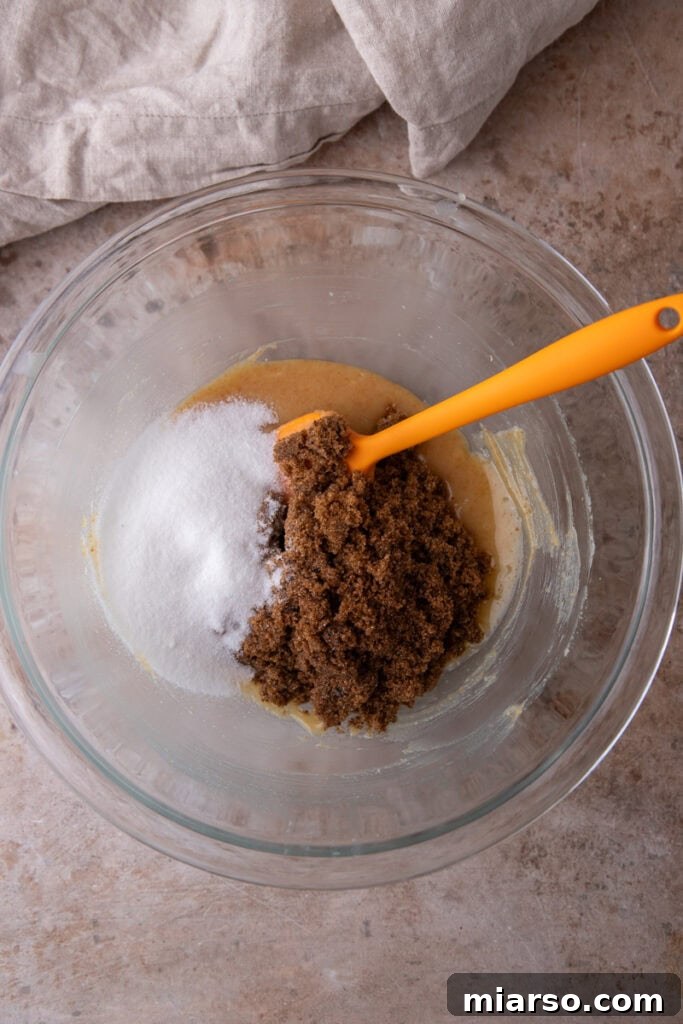 Mixing wet ingredients for Pumpkin Snickerdoodles