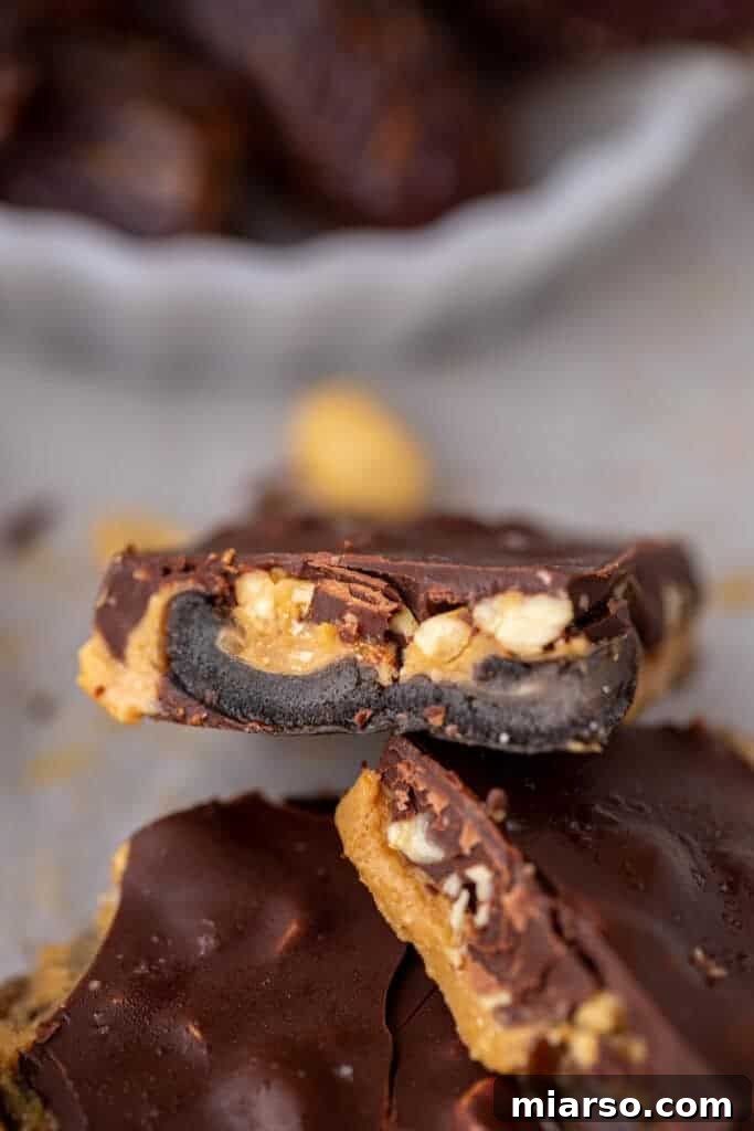 Slice of peanut butter chocolate bark on parchment paper