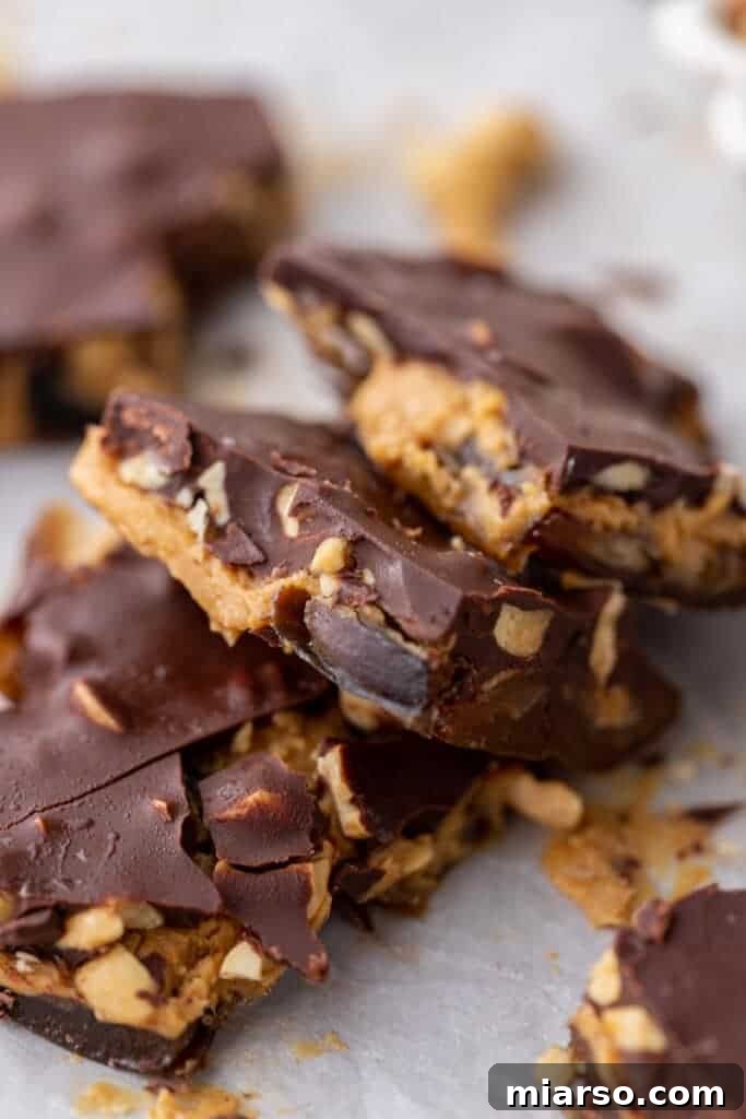 Chopped up date bark with peanut butter and chocolate layers