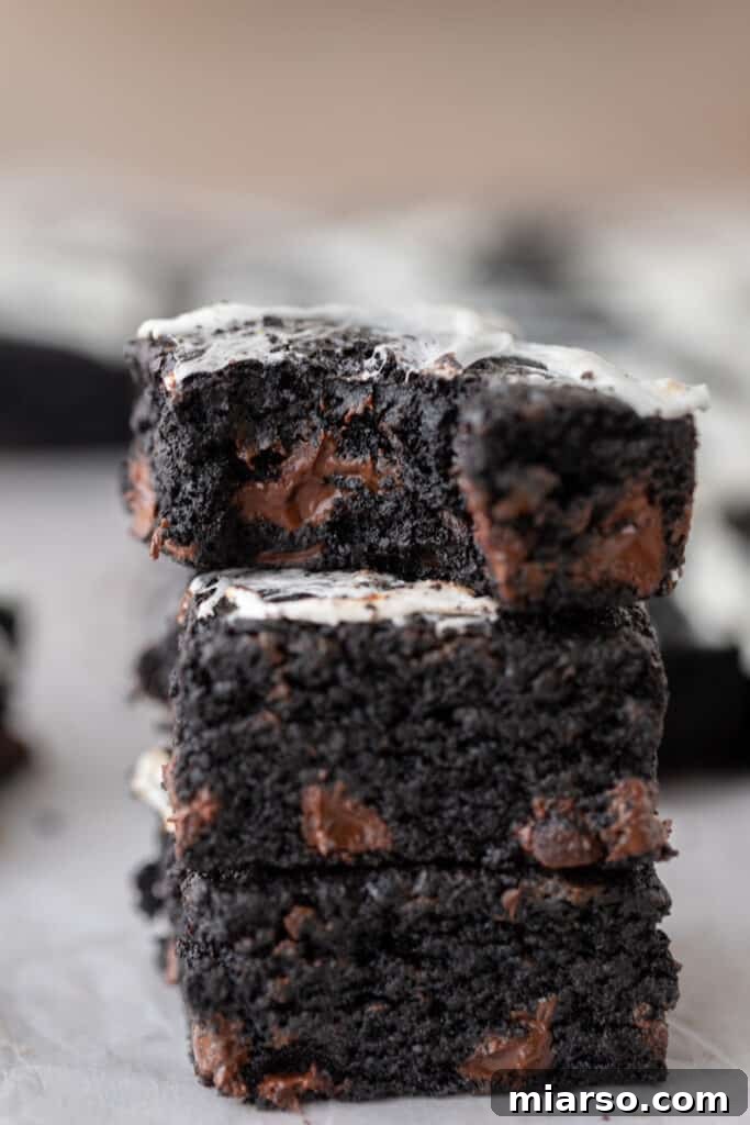 Stack of black cocoa powder brownies