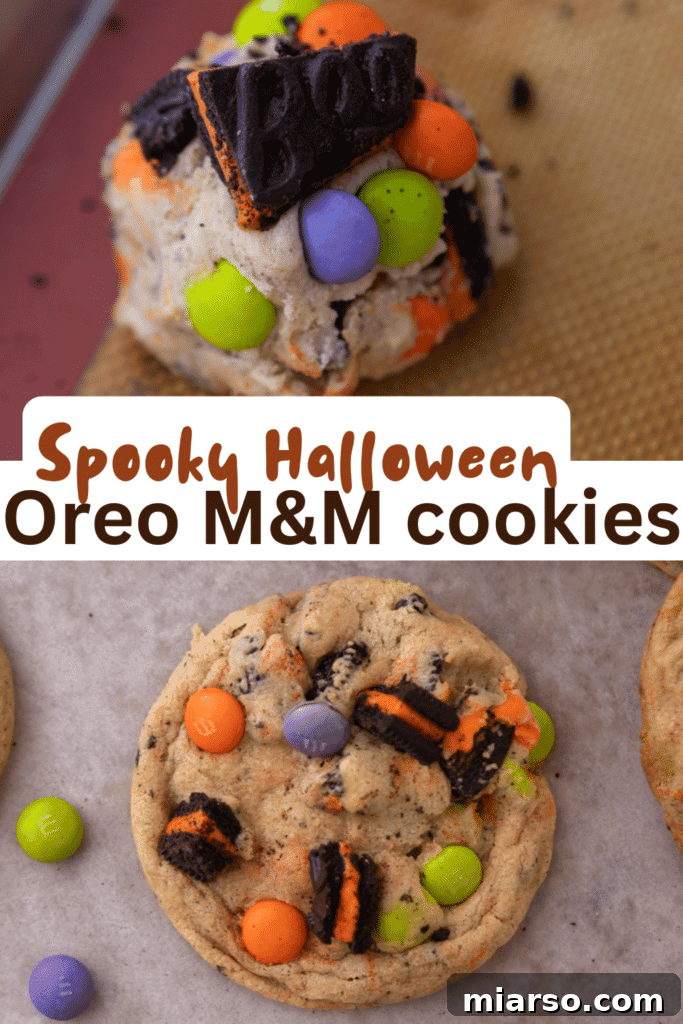 Festive Halloween Oreo M&M's cookies on a cooling rack