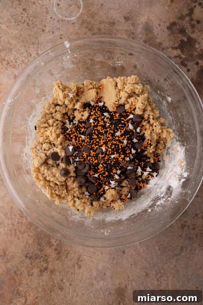 chocolate sitting on top of mixed batter