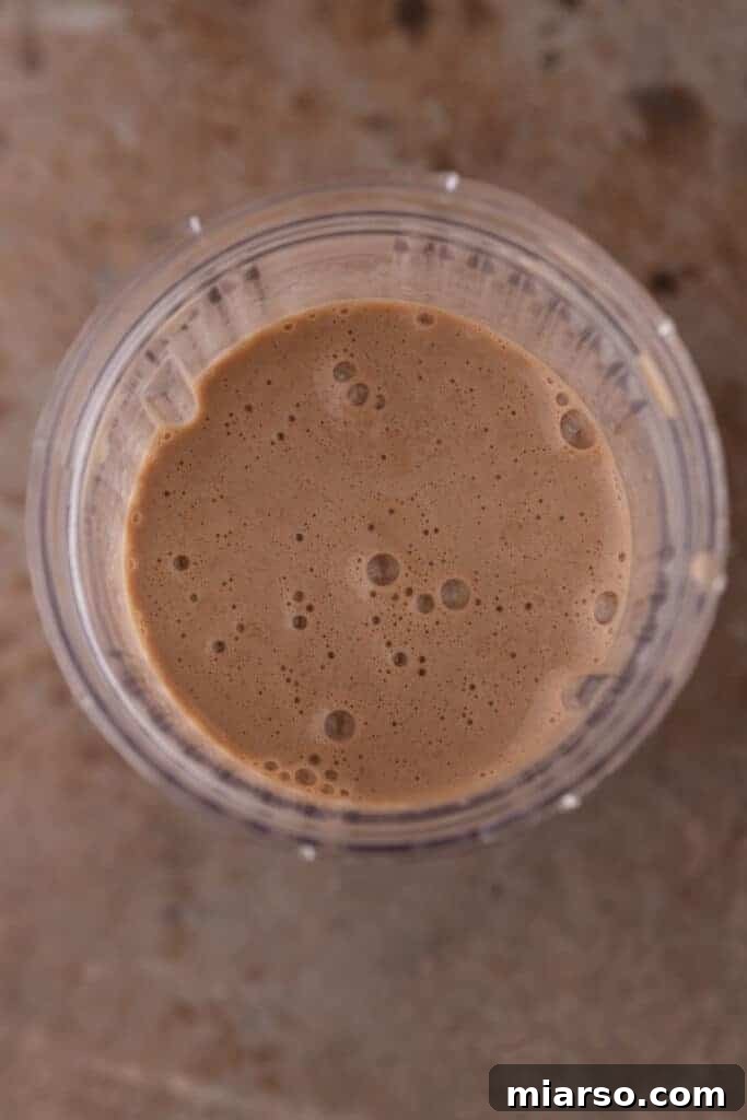 The perfectly blended Peppermint Mocha Frappuccino swirling in the blender.