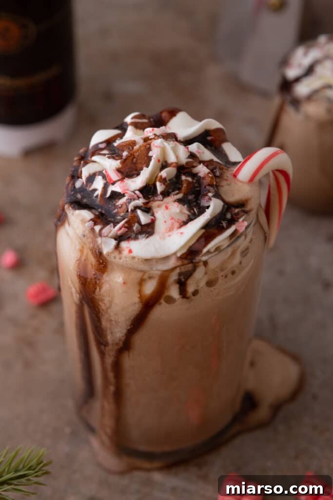 A beautifully presented Copycat Starbucks Peppermint Mocha Frappuccino, perfect for the holidays.