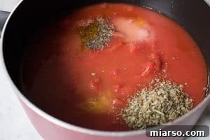 Tomatoes with the pepper, salt, basil, and orange juice