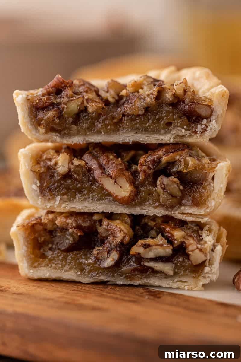 Close up of mini pecan pie cut in half