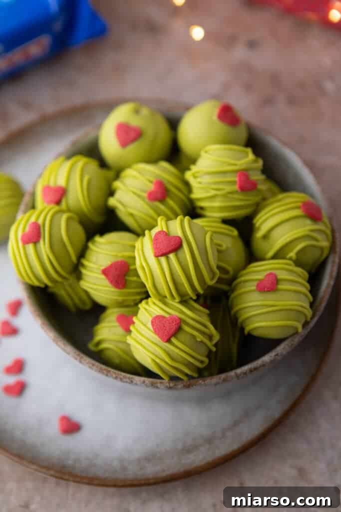 grinch oreo truffles in a bowl