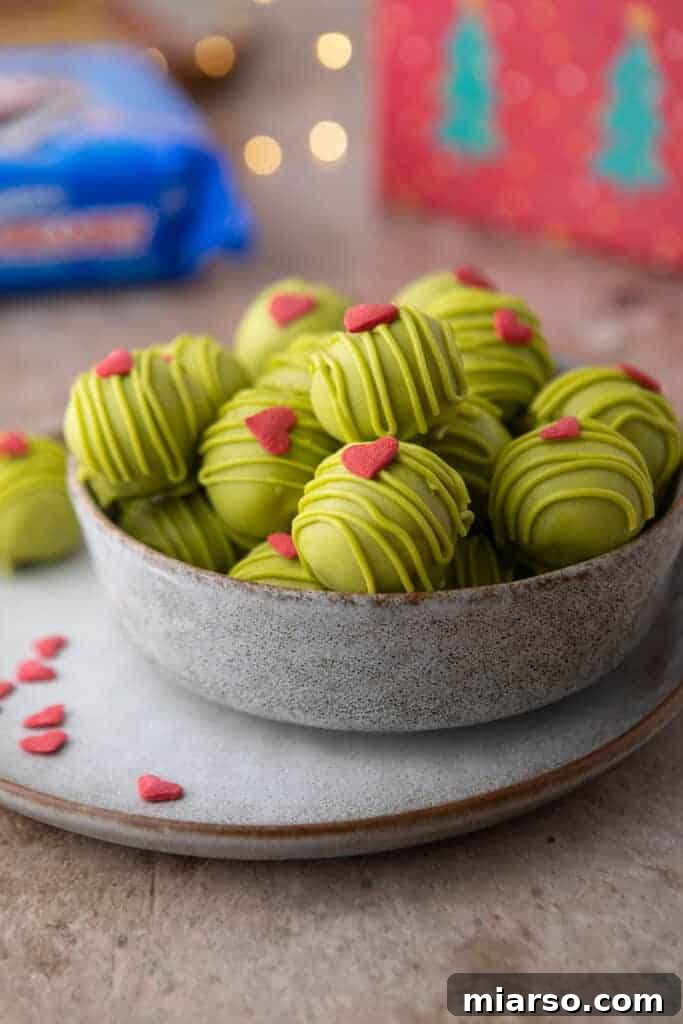 grinch oreo truffles in a bowl