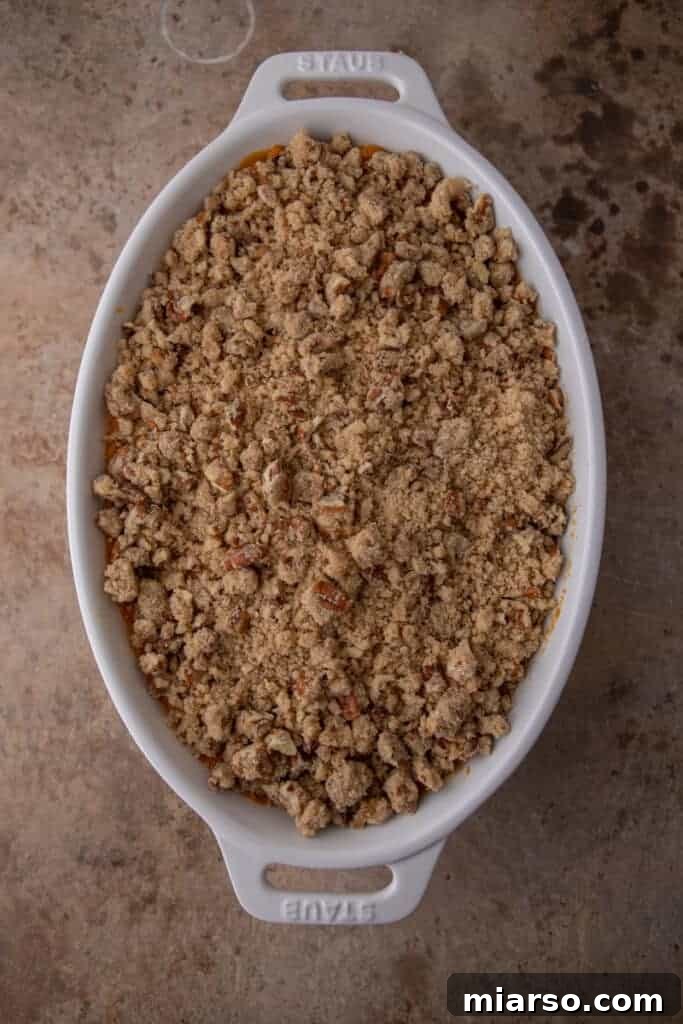 Pecan-Topped Sweet Potato Perfection 12 a fully completed sweet potato casserole with pecan topping