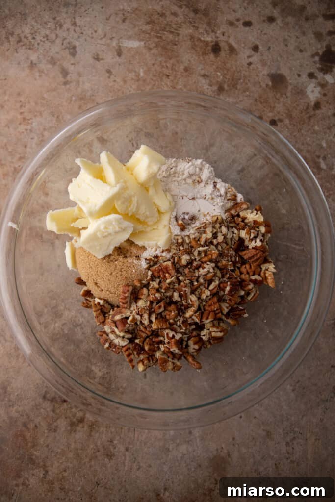 Pecan-Topped Sweet Potato Perfection 6 unmixed topping ingredients in a bowl