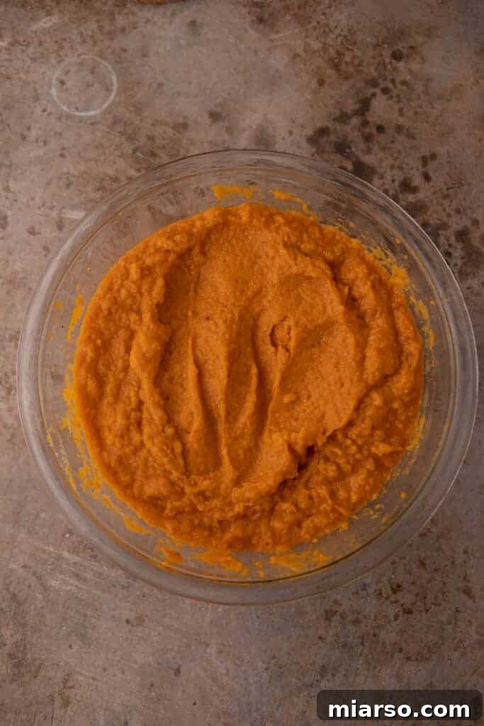 Pecan-Topped Sweet Potato Perfection 10 mixed sweetened potato base in a bowl