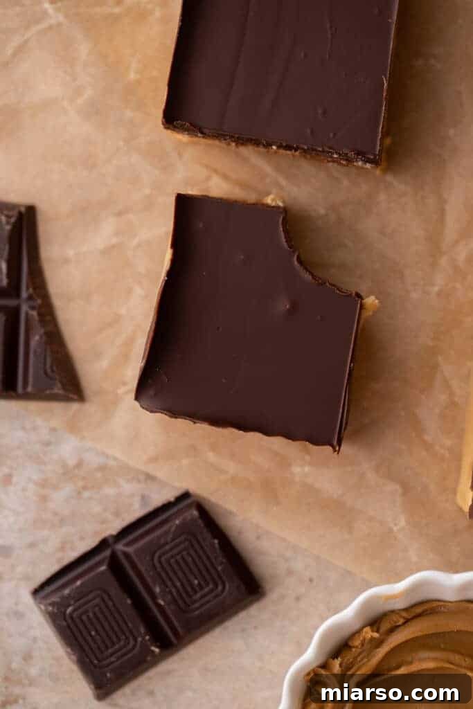 close up of a single square of chocolate with a bite taken out of it
