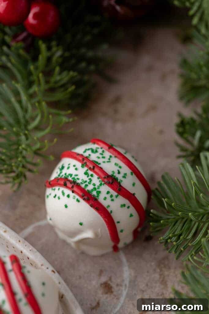 Easy No-Bake Little Debbie Christmas Tree Truffles 12 A single Little Debbie Christmas Tree Cake Truffle, beautifully decorated and presented by itself.