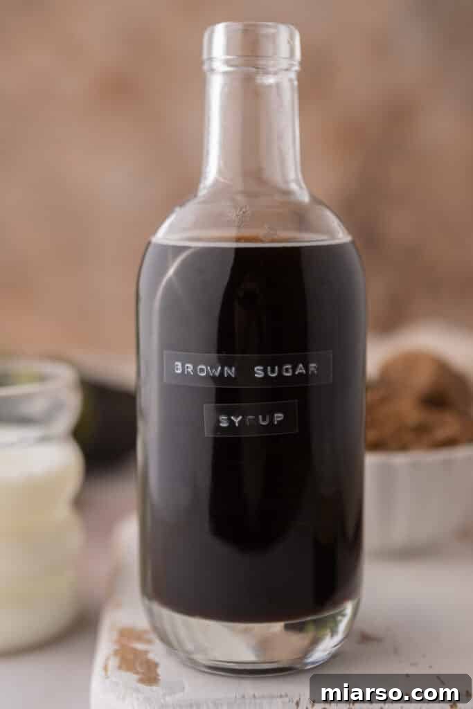 A jar of homemade Starbucks brown sugar syrup, ready to be used in delicious drinks.