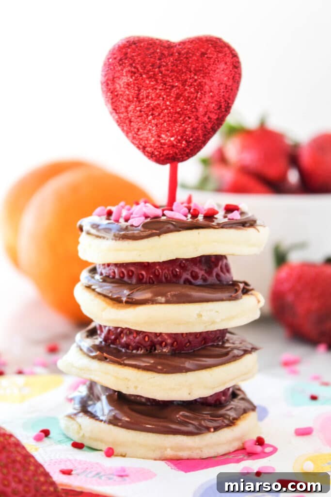 Mini pancake stacks with chocolate spread for kids