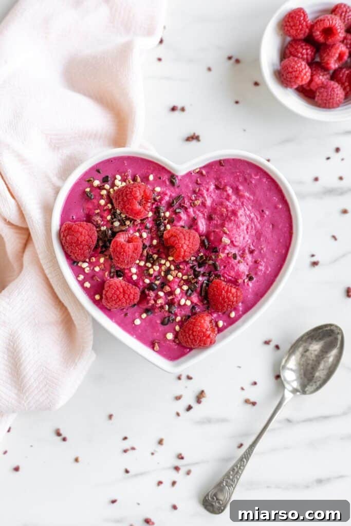 Pink oatmeal with berries for a Valentine's Day breakfast