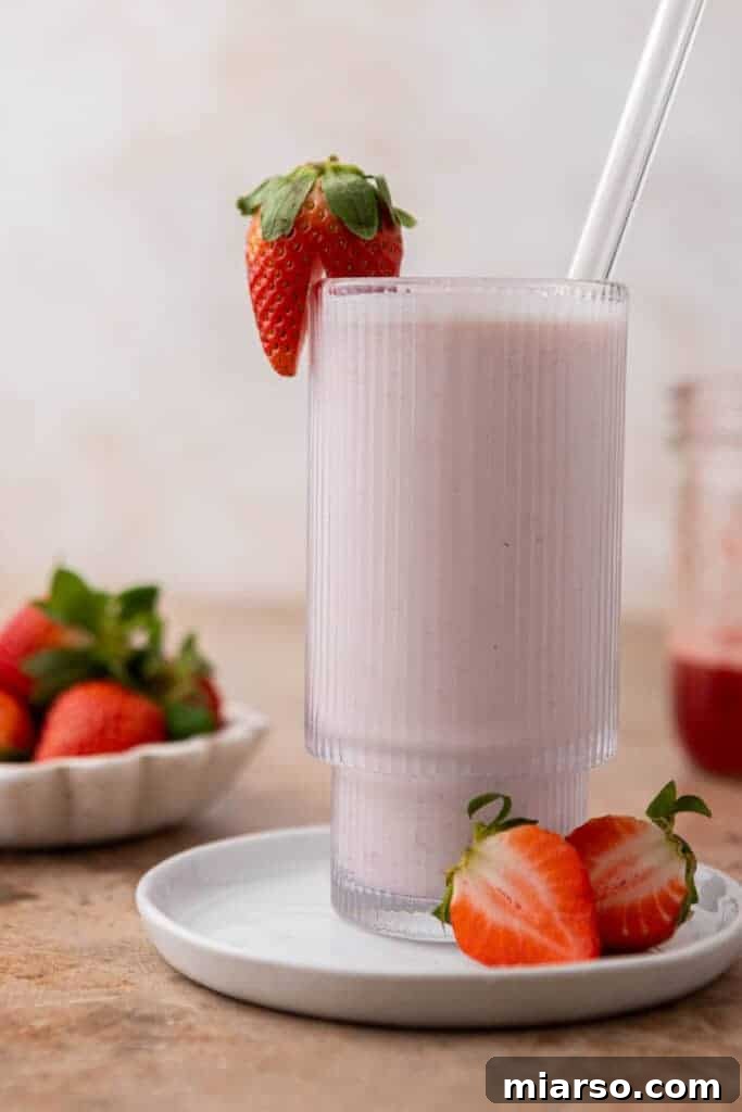 Homemade Pink Strawberry Milk made with fresh fruit