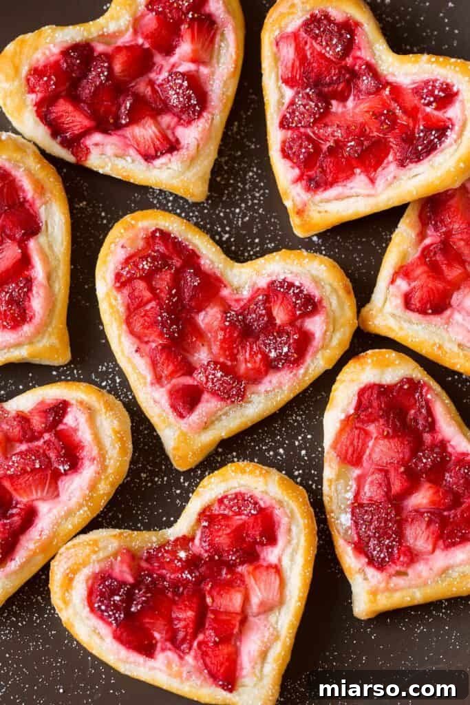 Heart-shaped cheese danishes with strawberry cream cheese
