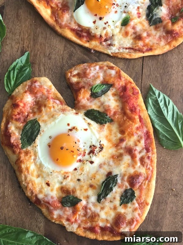 Savory pizza with egg and cheese, a unique breakfast idea