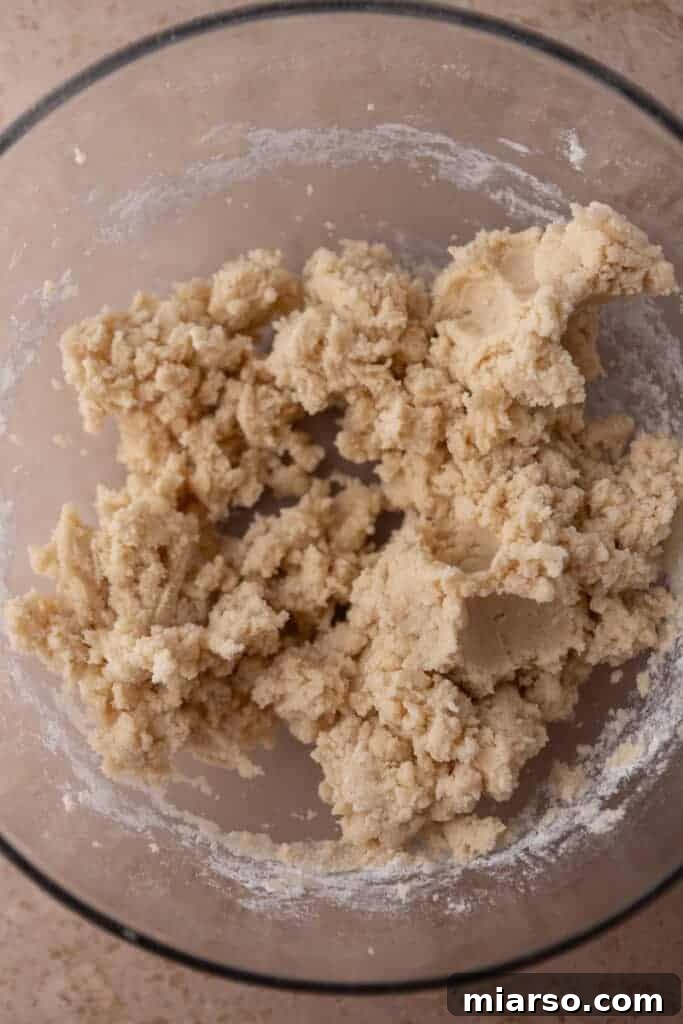 Ultimate Valentine Frosted Sugar Cookies 6 Cookie dough mixture in a bowl after dry ingredients are added