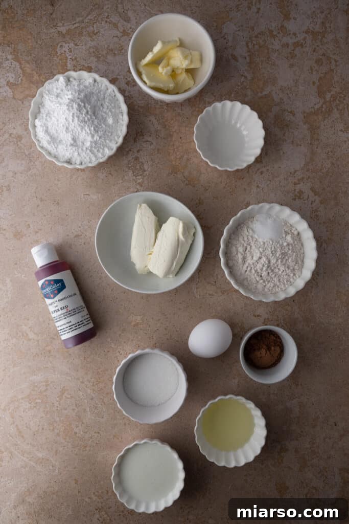Ingredients for the small batch Red Velvet cupcakes laid out on a clean surface, ready for mixing.