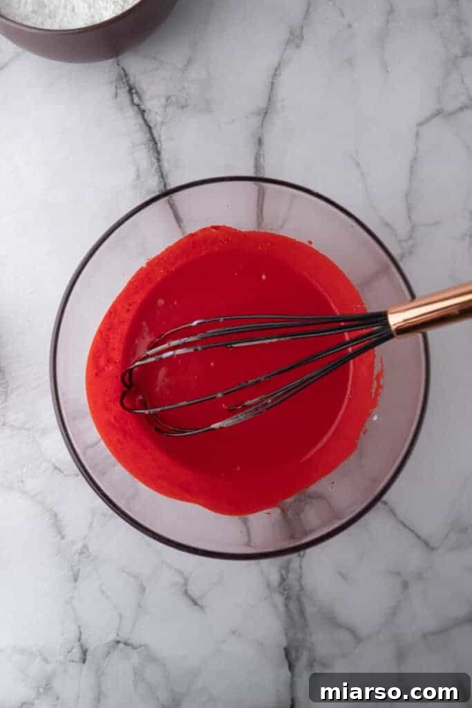 wet ingredients partially mixed in a bowl