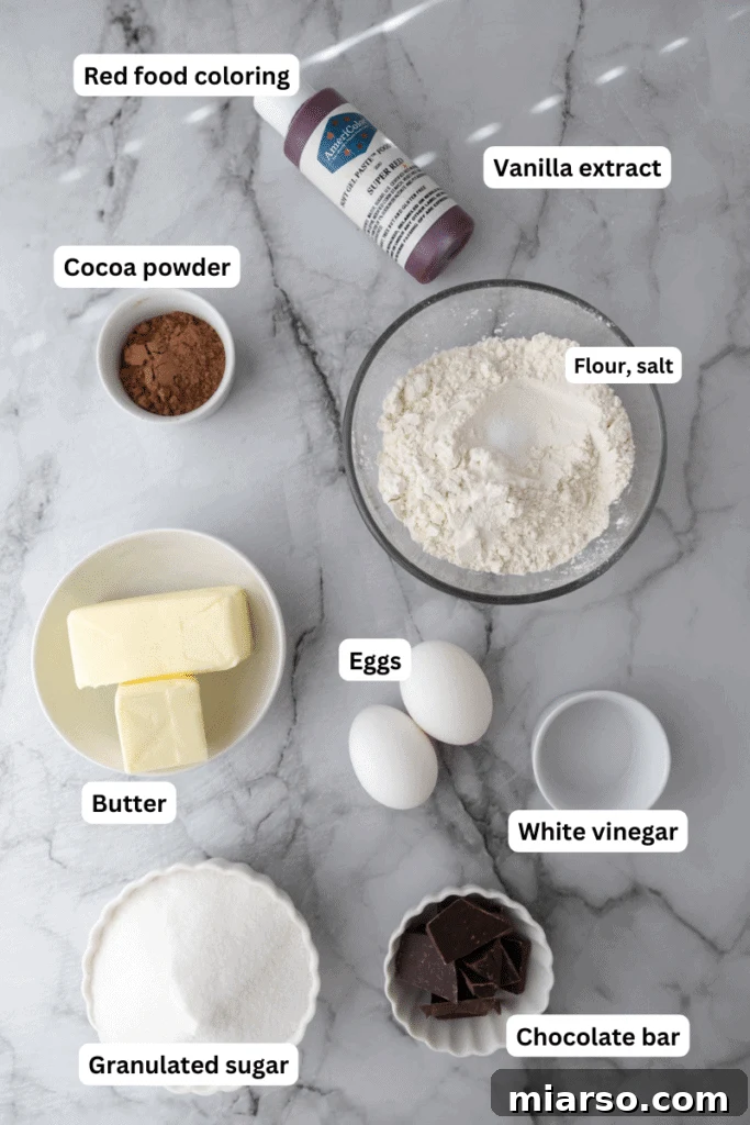 Ingredients for Fudgy Red Velvet Brownies neatly arranged on a kitchen counter, ready for baking.