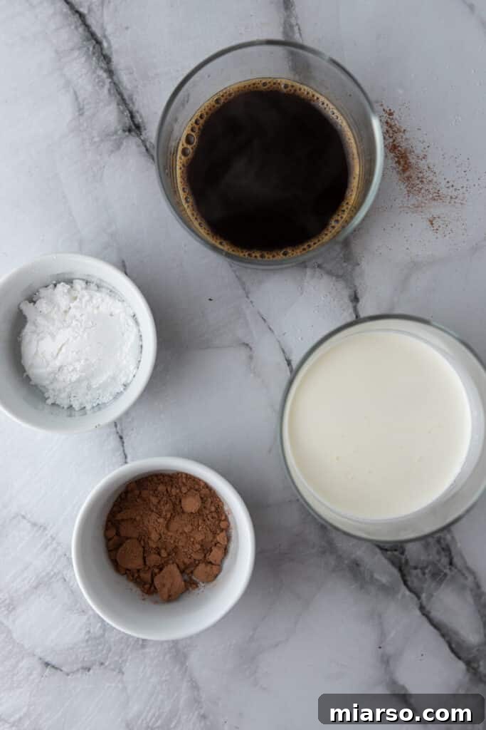 The Ultimate Einspanner Coffee with Velvety Whipped Cream 3 ingredients for the einspanner coffee recipe laid out