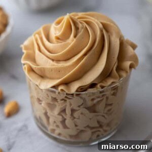 angled overhead shot of how to make peanut butter frosting in a cup