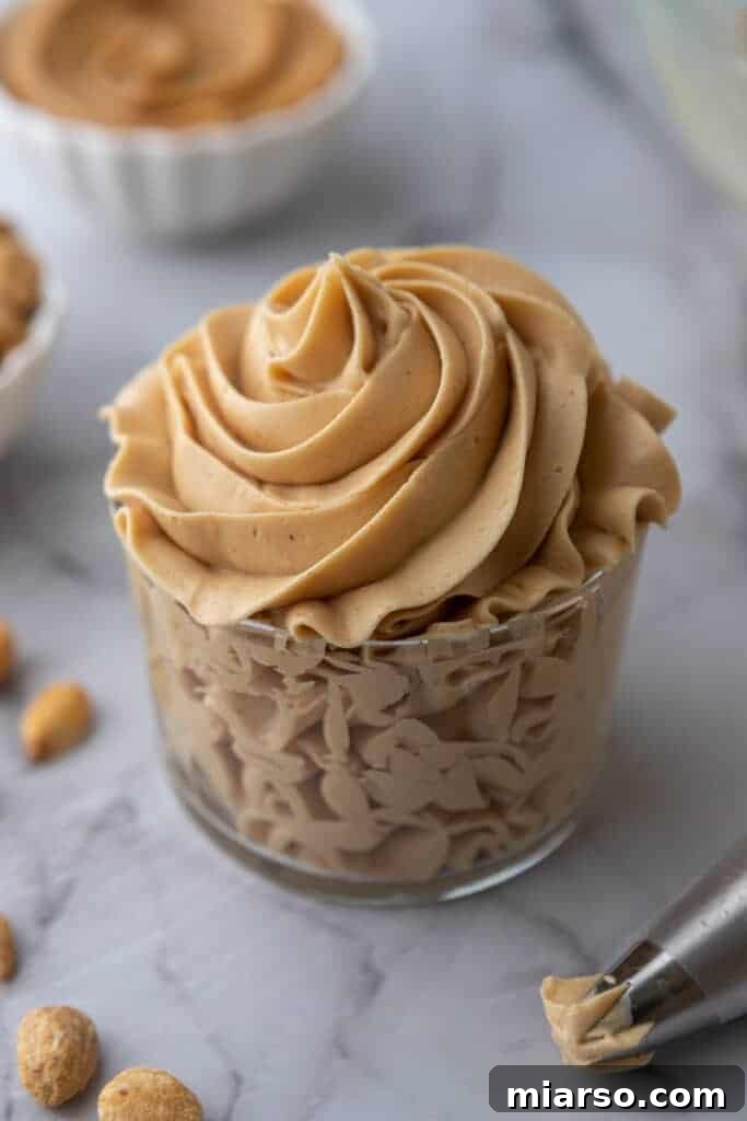 angled overhead shot of how to make peanut butter frosting in a cup