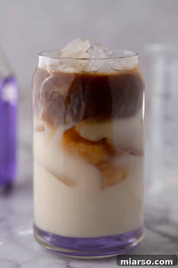 Homemade Starbucks Iced Lavender Oatmilk Latte 5 Ingredients in a cup