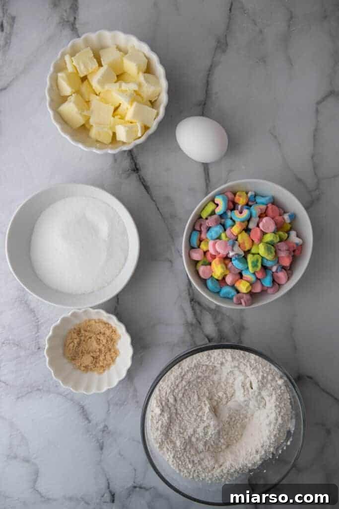 Magical Lucky Charms Cookie Delights 3 Ingredients laid out for making Lucky Charms cookies, including butter, sugar, flour, and a bowl of Lucky Charms marshmallows