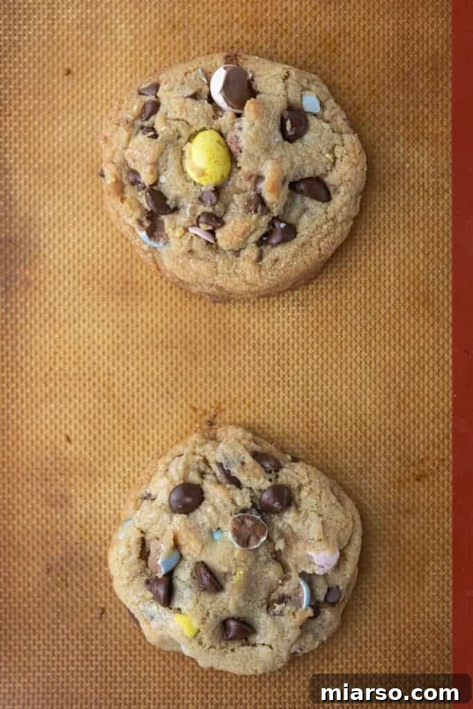 fully baked cadbury egg cookies on a baking sheet
