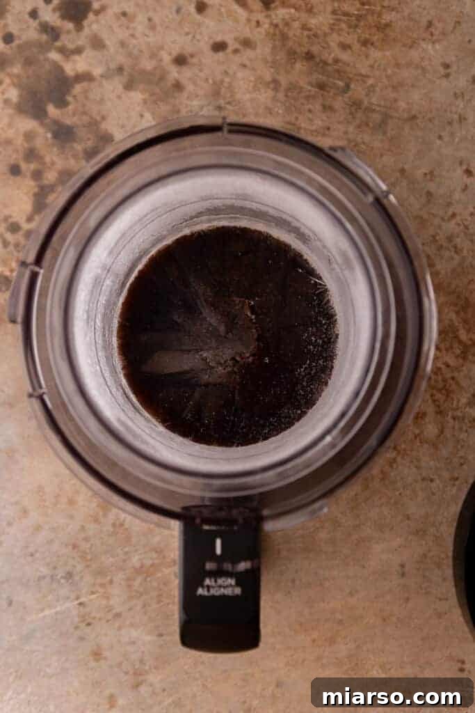 Elevate Your Protein Ninja Creami Ice Cream Perfection 3 Unmixed protein shake and pudding mix in a Ninja Creami pint
