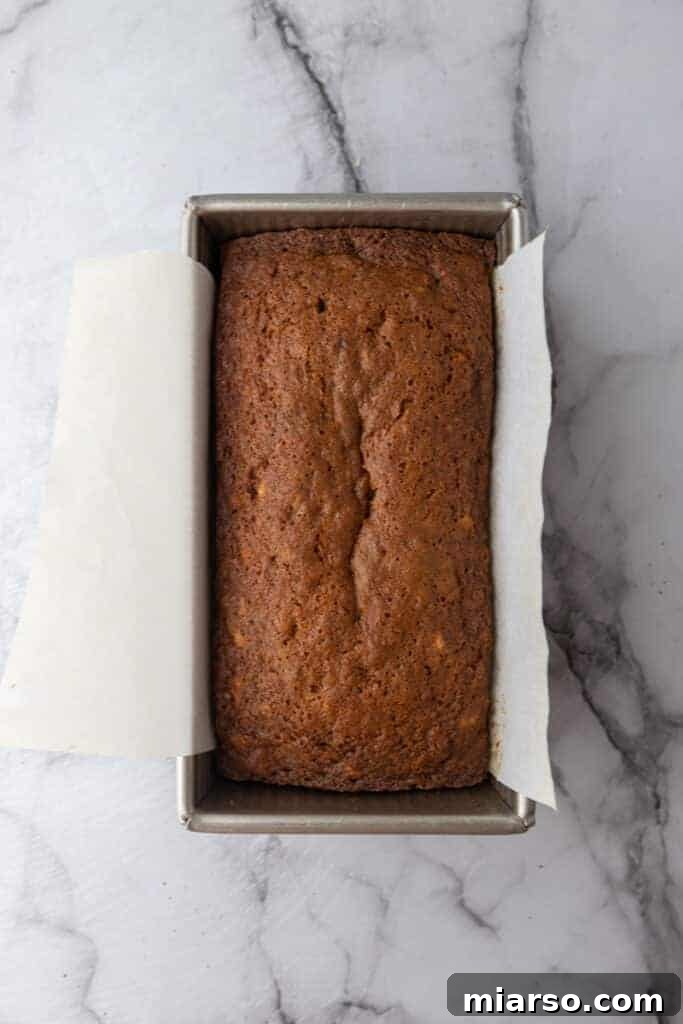 fully baked loaf cake in a pan