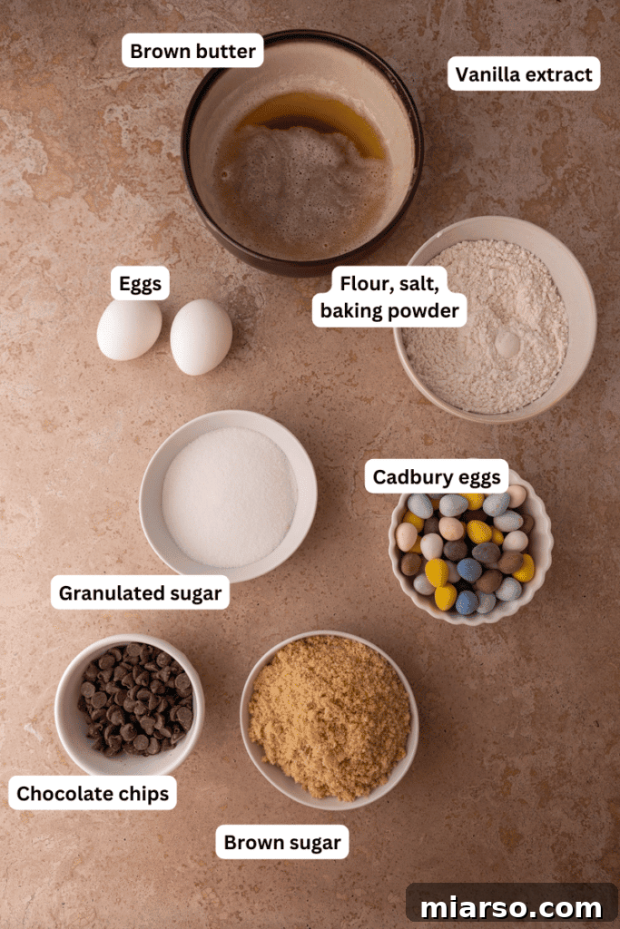 Gooey Giant Cadbury Mini Egg Skillet Cookie 3 Assortment of fresh ingredients for baking a skillet cookie laid out on a kitchen counter.