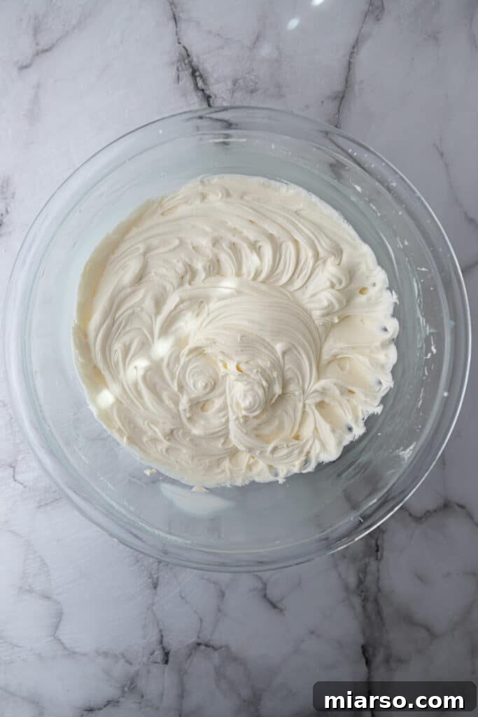 Mascarpone Frosting Perfection 7 fully mixed ingredients in a bowl