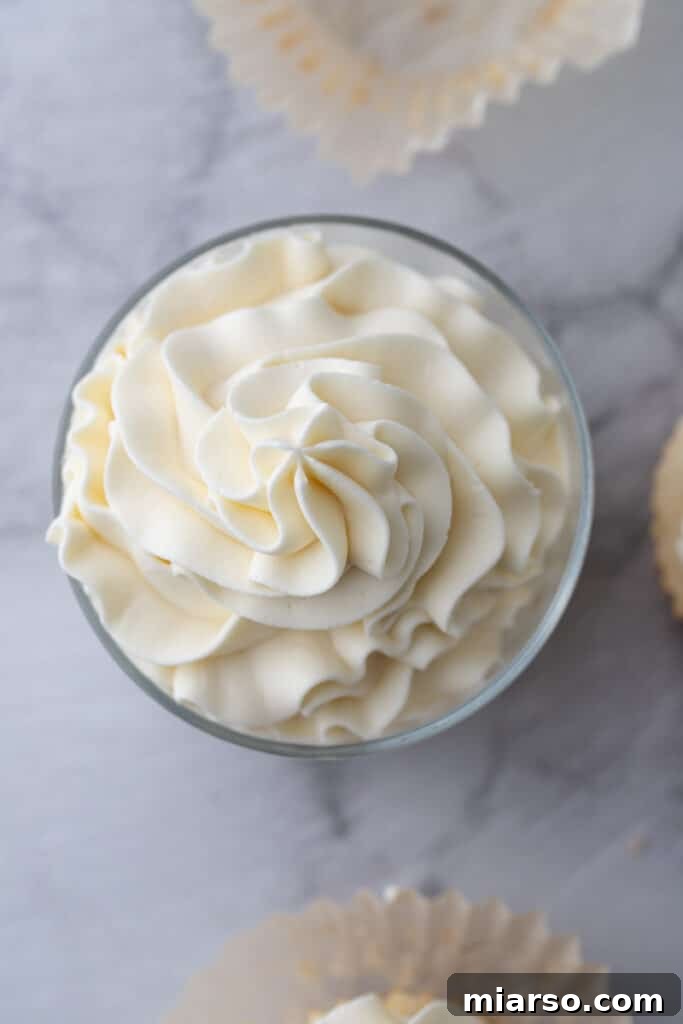 Mascarpone Frosting Perfection 10 overhead shot of the mascarpone cake frosting recipe in a cup