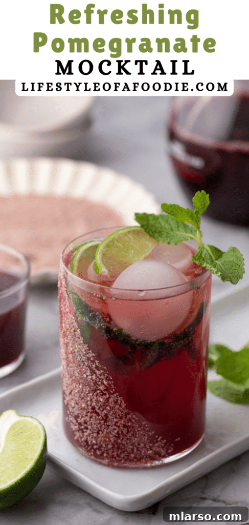 pinterest pin of the pomegranate mocktail recipe