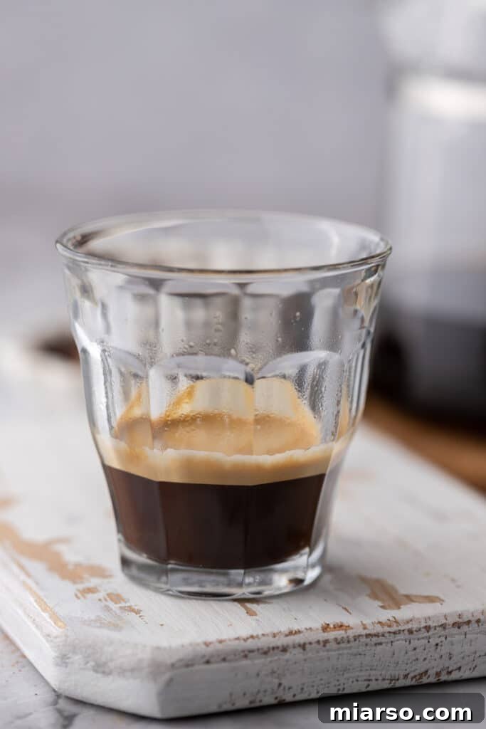 Espresso being poured into a cup for the Red Eye Coffee