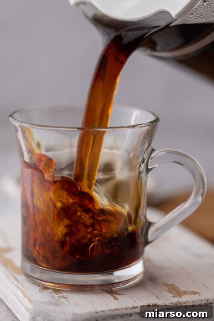 Regular brewed coffee being poured into a glass for the Red Eye Coffee