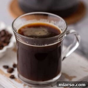 Red Eye Coffee Recipe in a glass on a coaster
