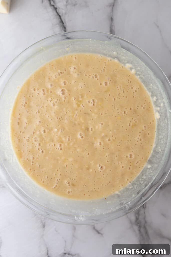 Mixed batter for Tornado Cake recipe in a bowl, smooth and ready to pour.