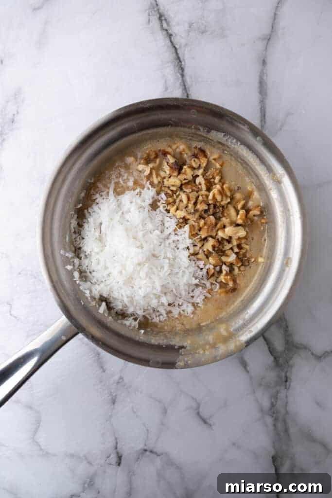 Icing ingredients for Tornado Cake recipe simmering in a pot, creating a luscious topping.