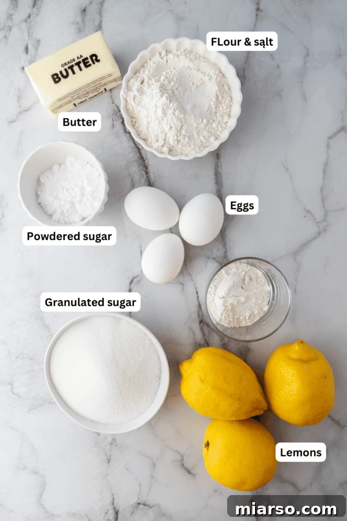 Ingredients laid out for the easy lemon bars recipe, including lemons, eggs, flour, and butter.