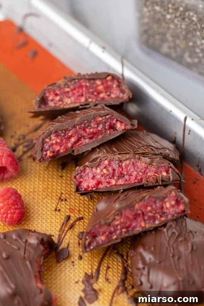 Easy Healthy Raspberry Jam Chocolate Bites sliced in half