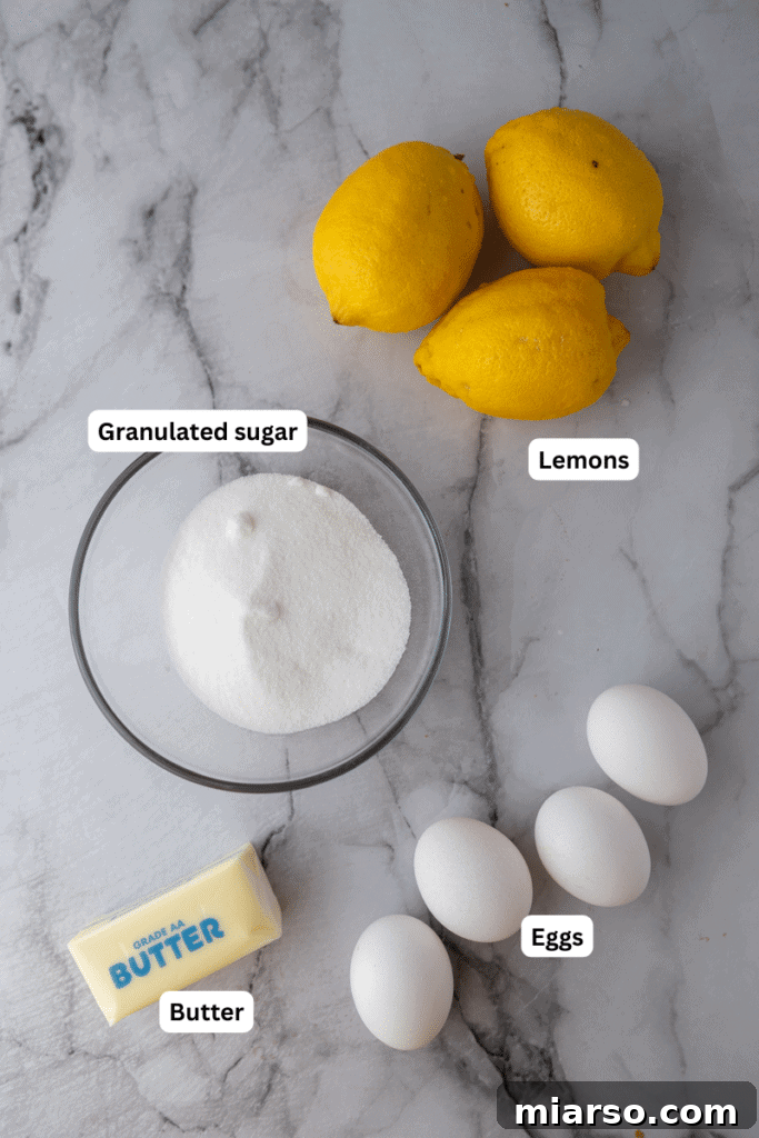 Microwave Magic: Luscious Lemon Curd in Minutes 3 Key ingredients for microwave lemon curd recipe laid out, including fresh lemons, eggs, sugar, and butter.