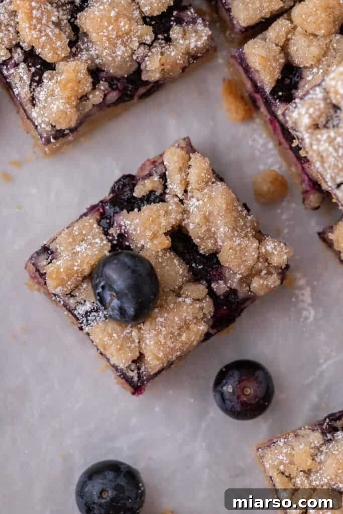 Close-up shot of a single blueberry blondie square