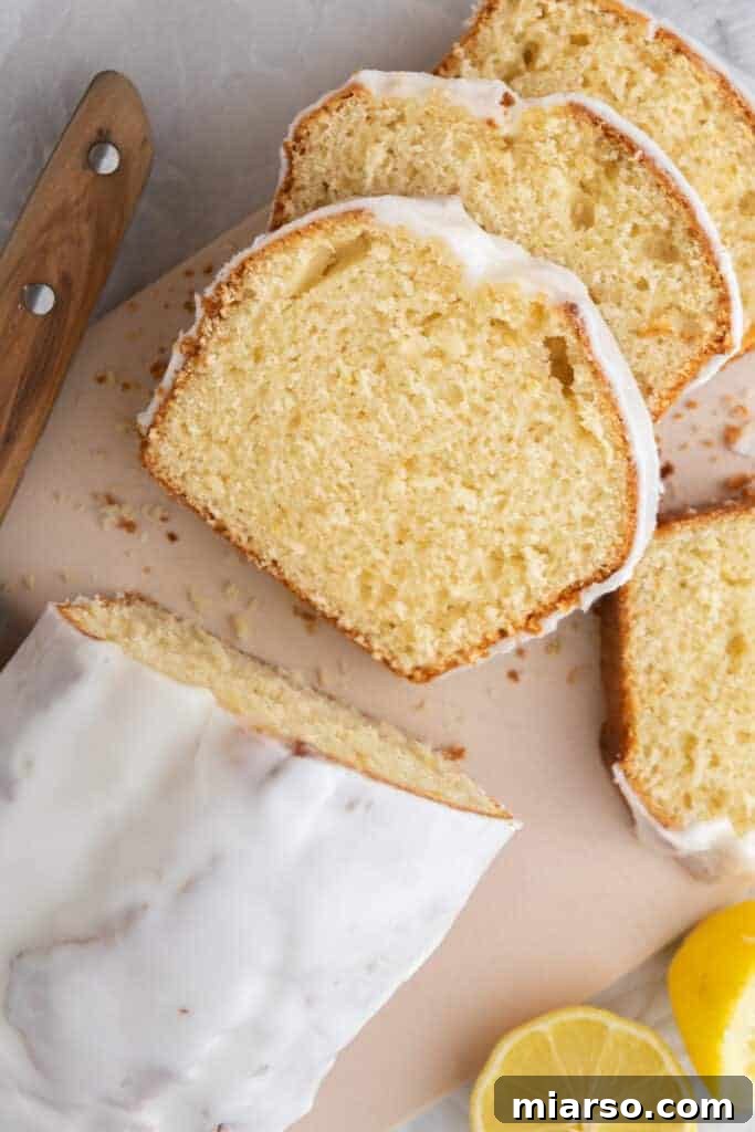 Another overhead shot of the Whole Lemon Blender Cake, showcasing its texture and glaze
